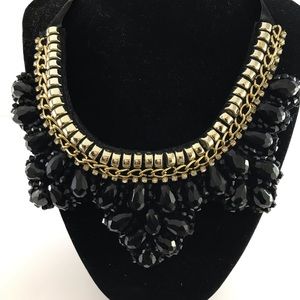 Black and gold tie costume necklace